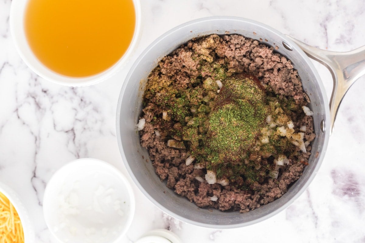 ground beef in a skillet with spices