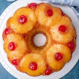 overhead view of pineapple upside down bundt cake on a plate