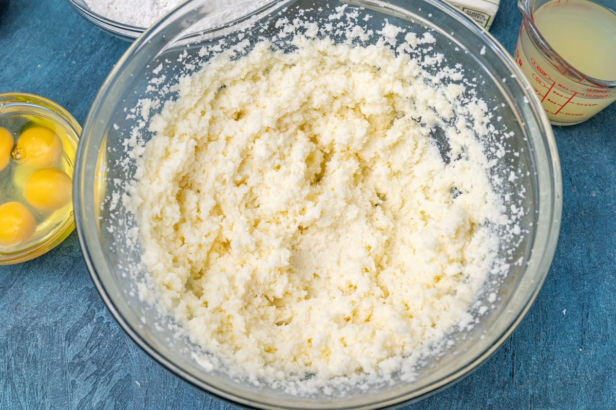 butter and sugar mixed in a glass bowl