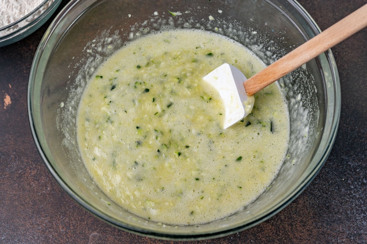 wet ingredients for zucchini bread in a bowl