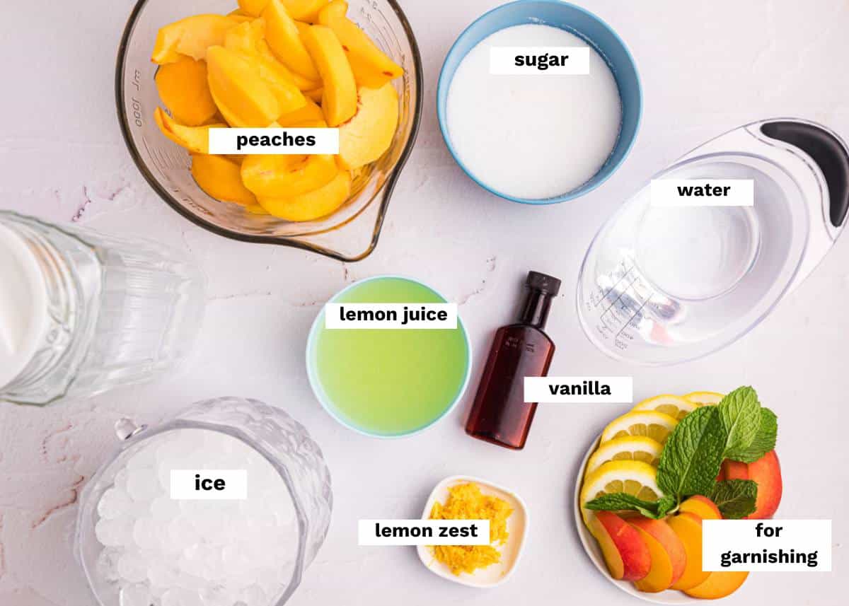 ingredients for peach lemonade on a table