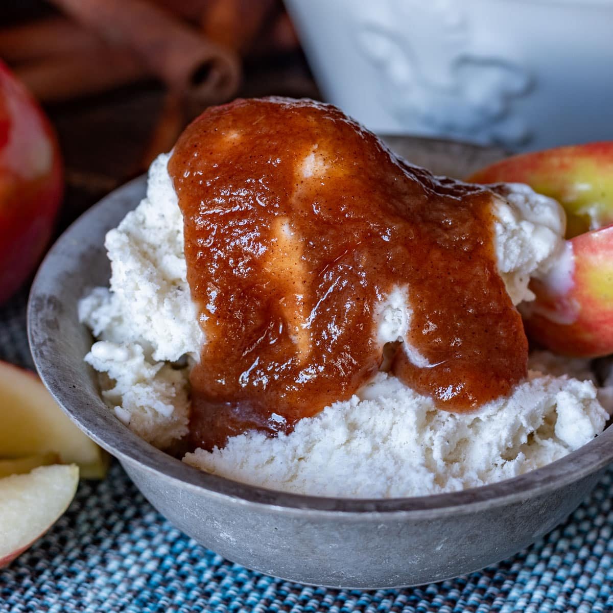 apple butter over ice cream in a bowl