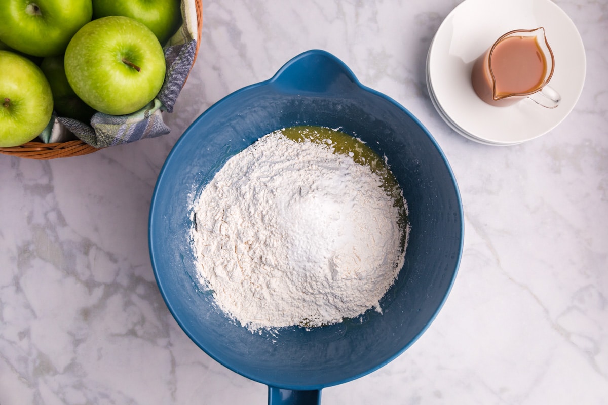 dry ingredients over wet ingredients in a bowl