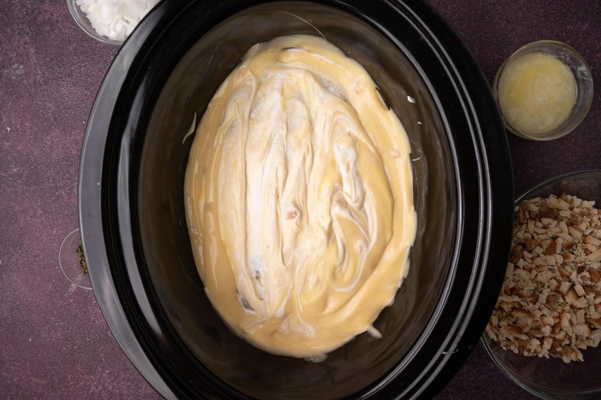 chicken and cream of chicken soup in a slow cooker