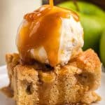 caramel pouring over apple cake with ice cream