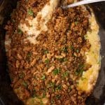 crockpot chicken and stuffing with a spoon