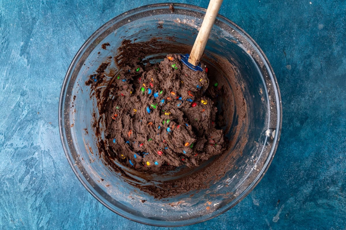 chocolate M&M cookie dough in a bowl