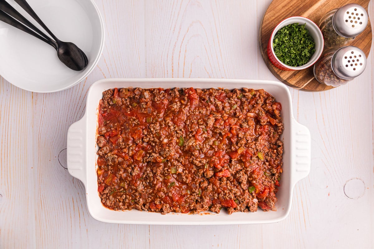 ground beef and tomatoes in a 9x13" casserole