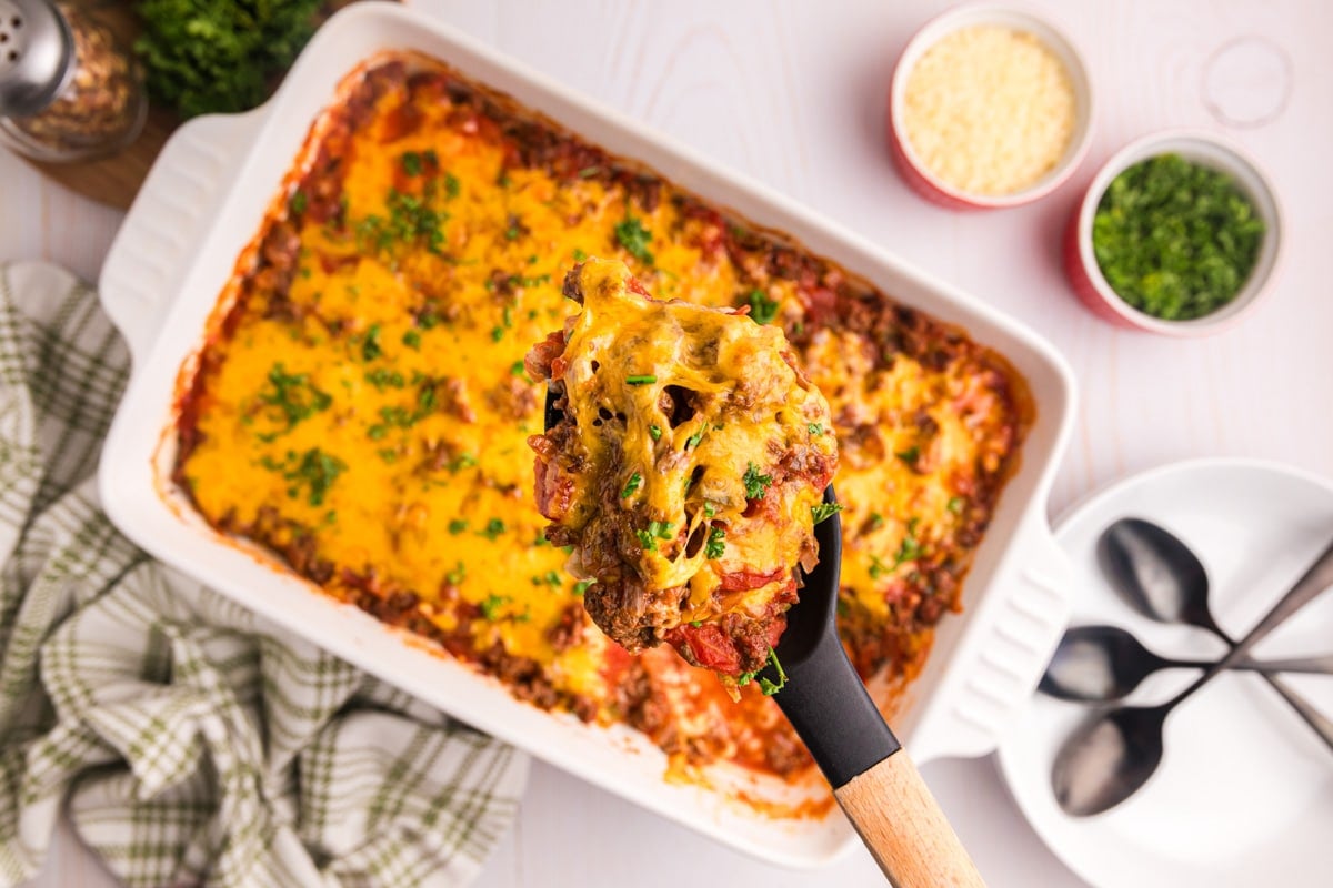 overhead view of johnny marzetti casserole with a spoon