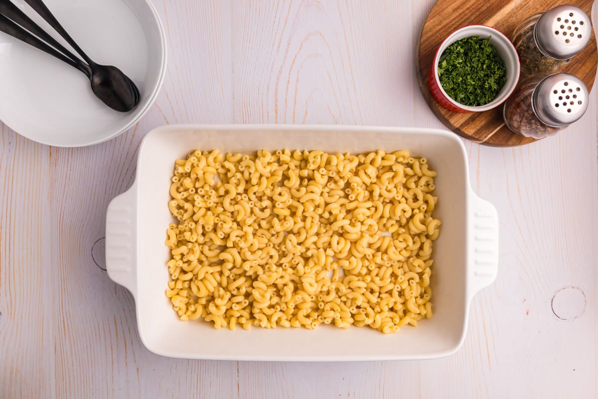 elbow macaroni in a white casserole dish