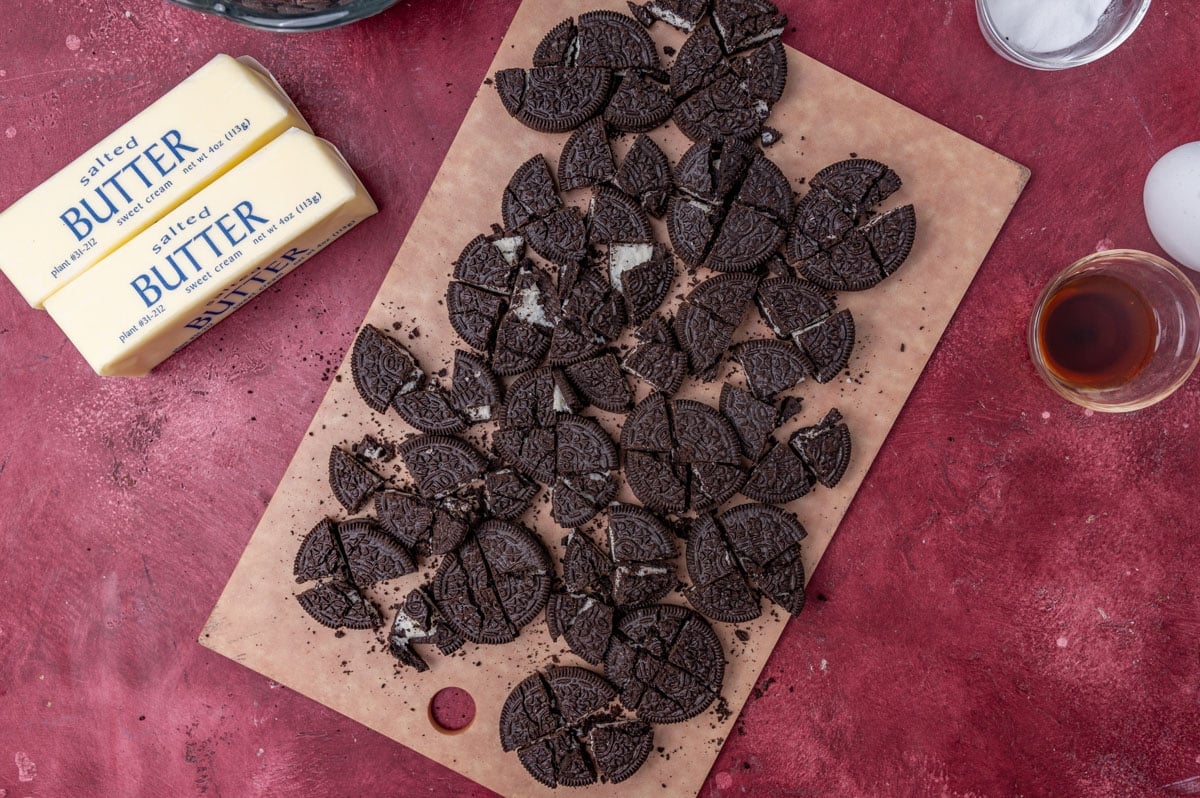 chopped oreos on a cutting board on at able