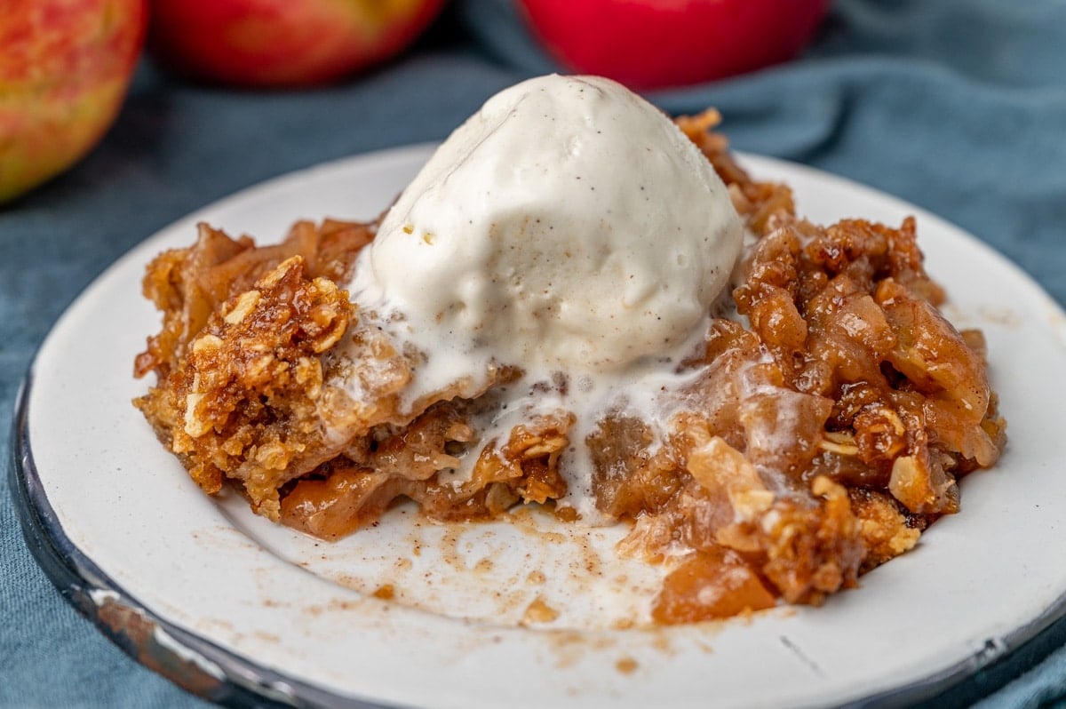 apple crisp with ice cream on a plate