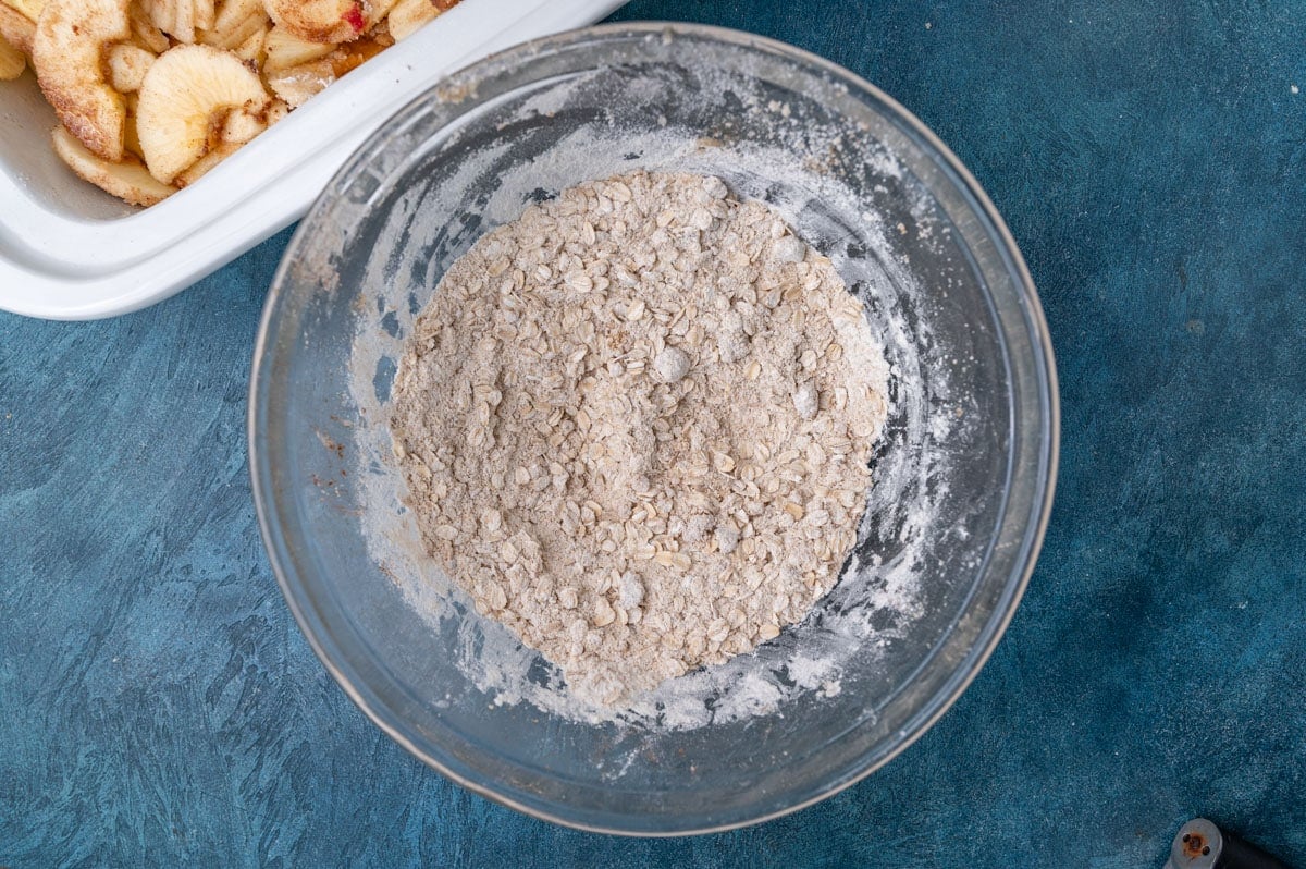 a bowl of sugar, oats and flour mixed up