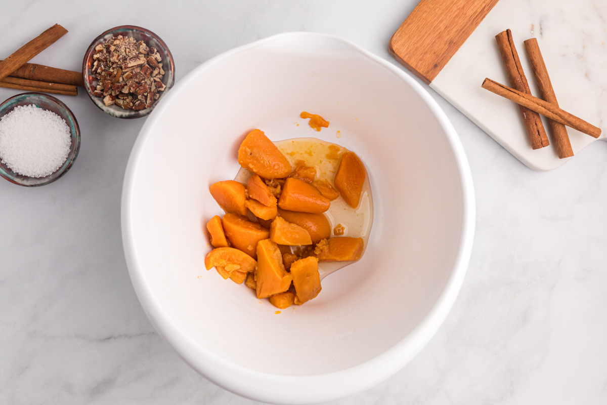 cooked sweet potato in a white bowl