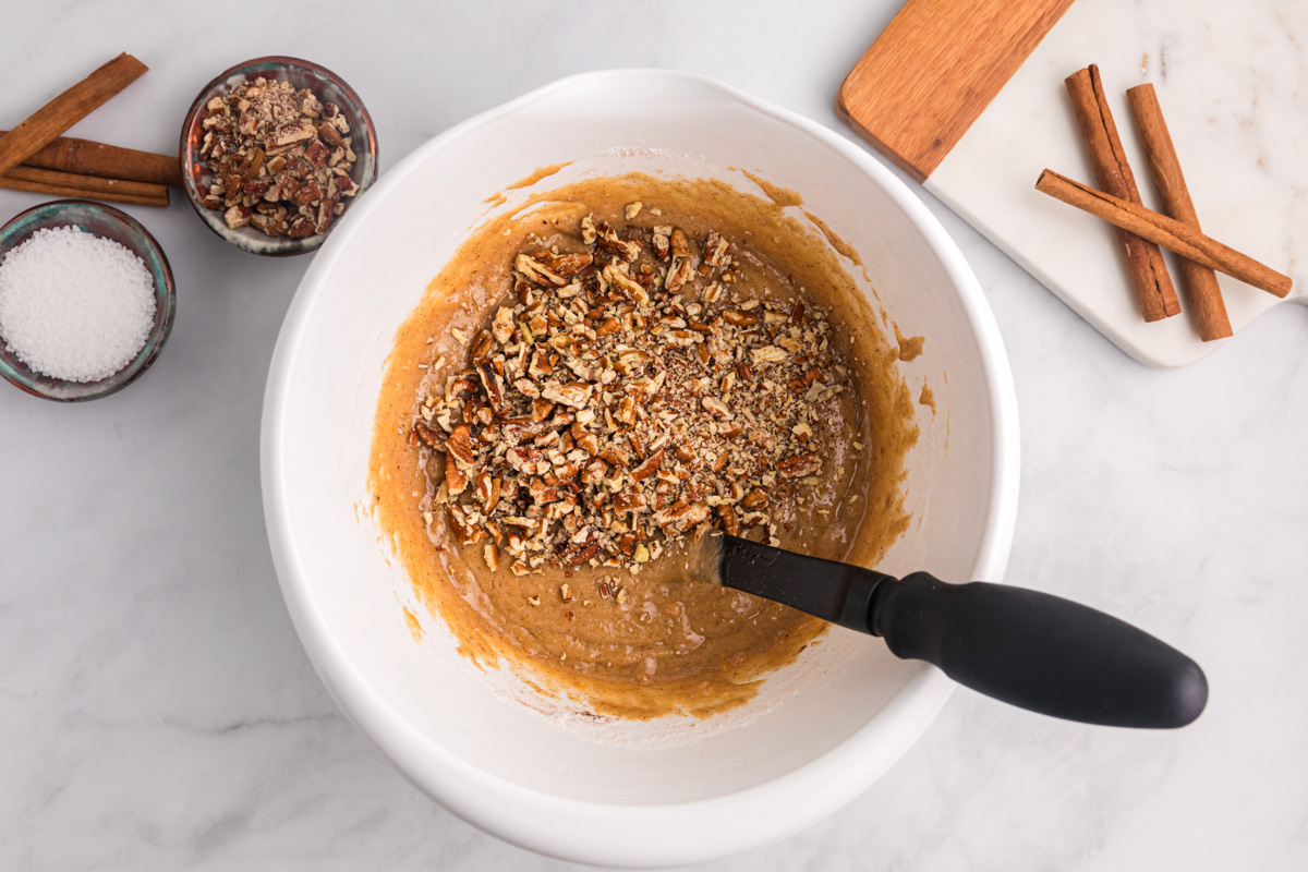 pecans over quick bread batter in a mixing bowl