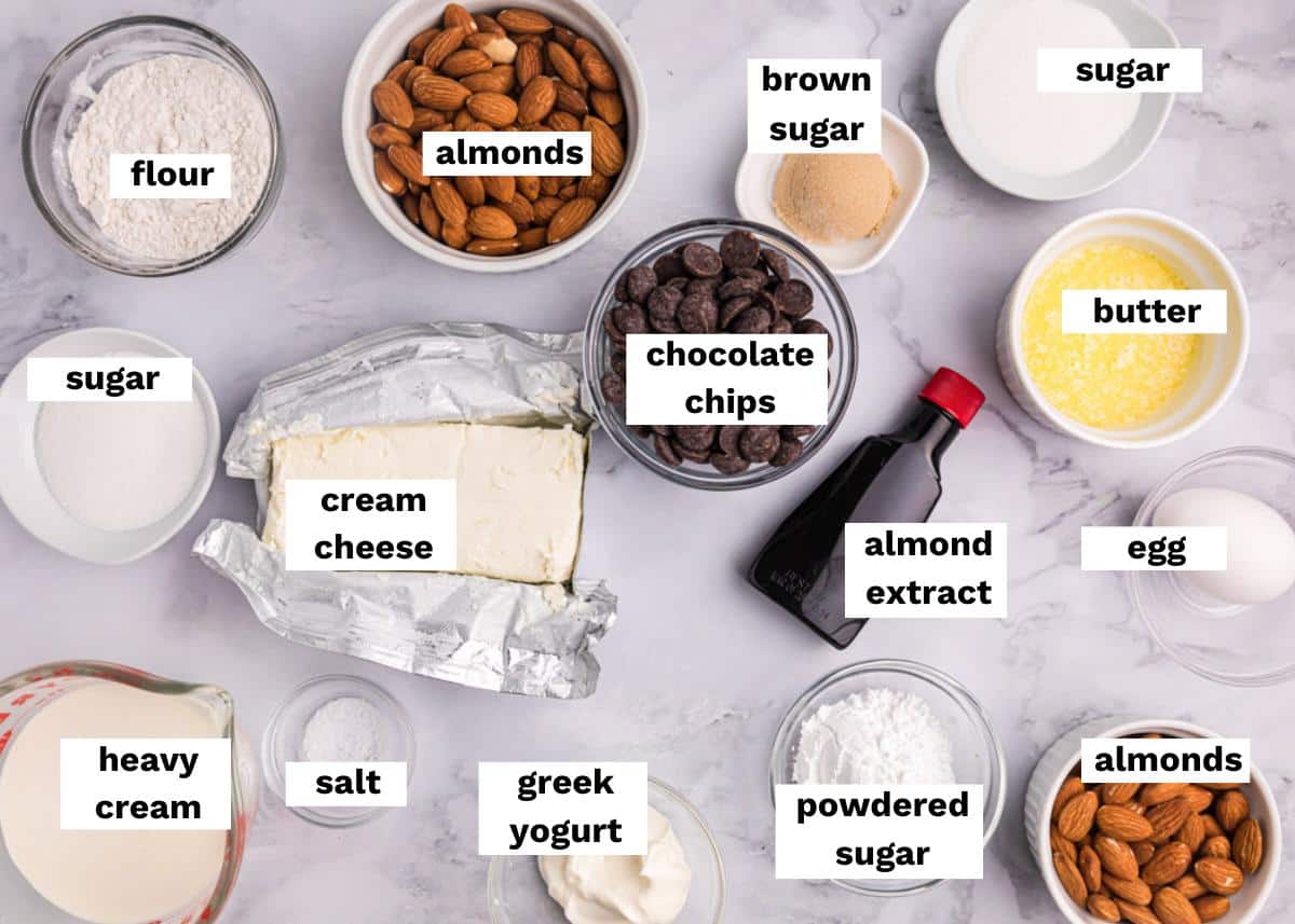 ingredients for almond chocolate chip cheesecakes on a table