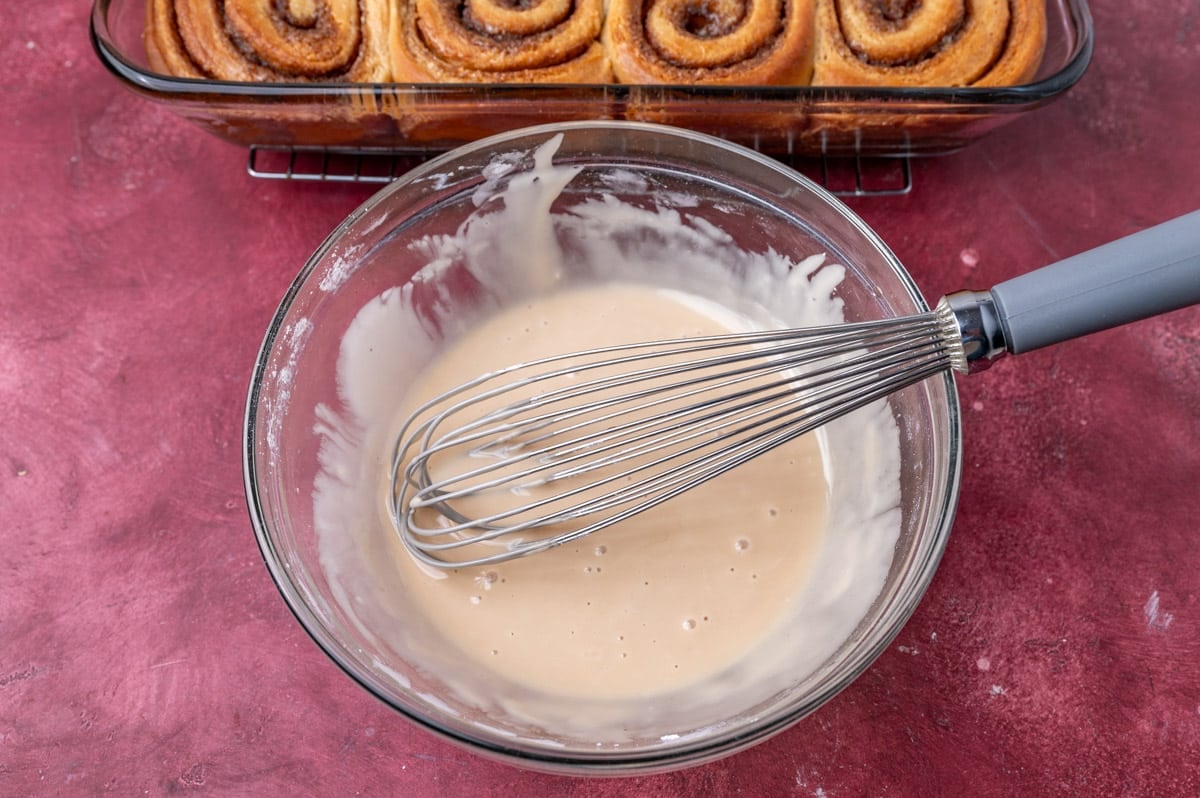 glaze in a glass bowl with a whisk