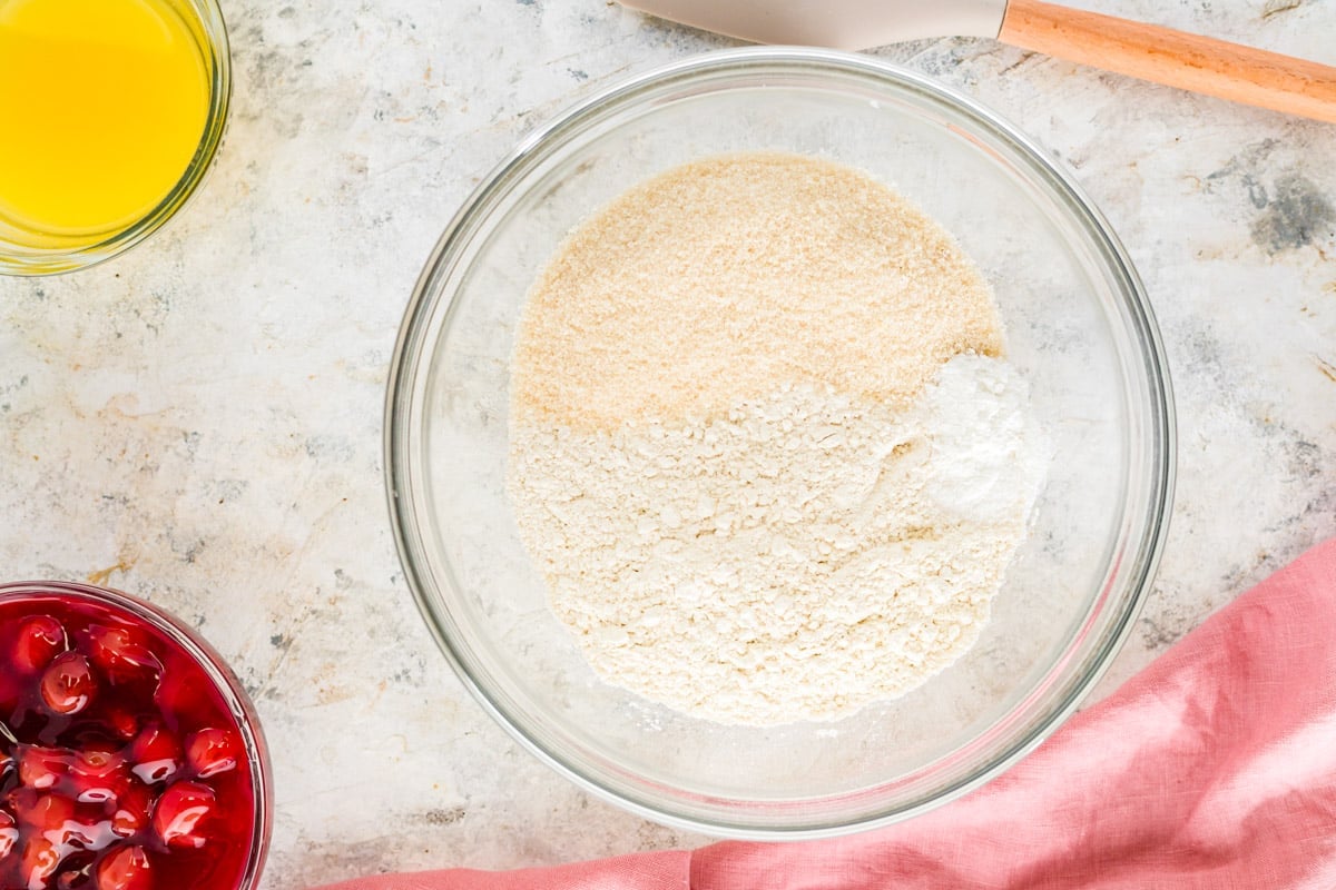 dry ingredients for cherry bars in a glass bowl