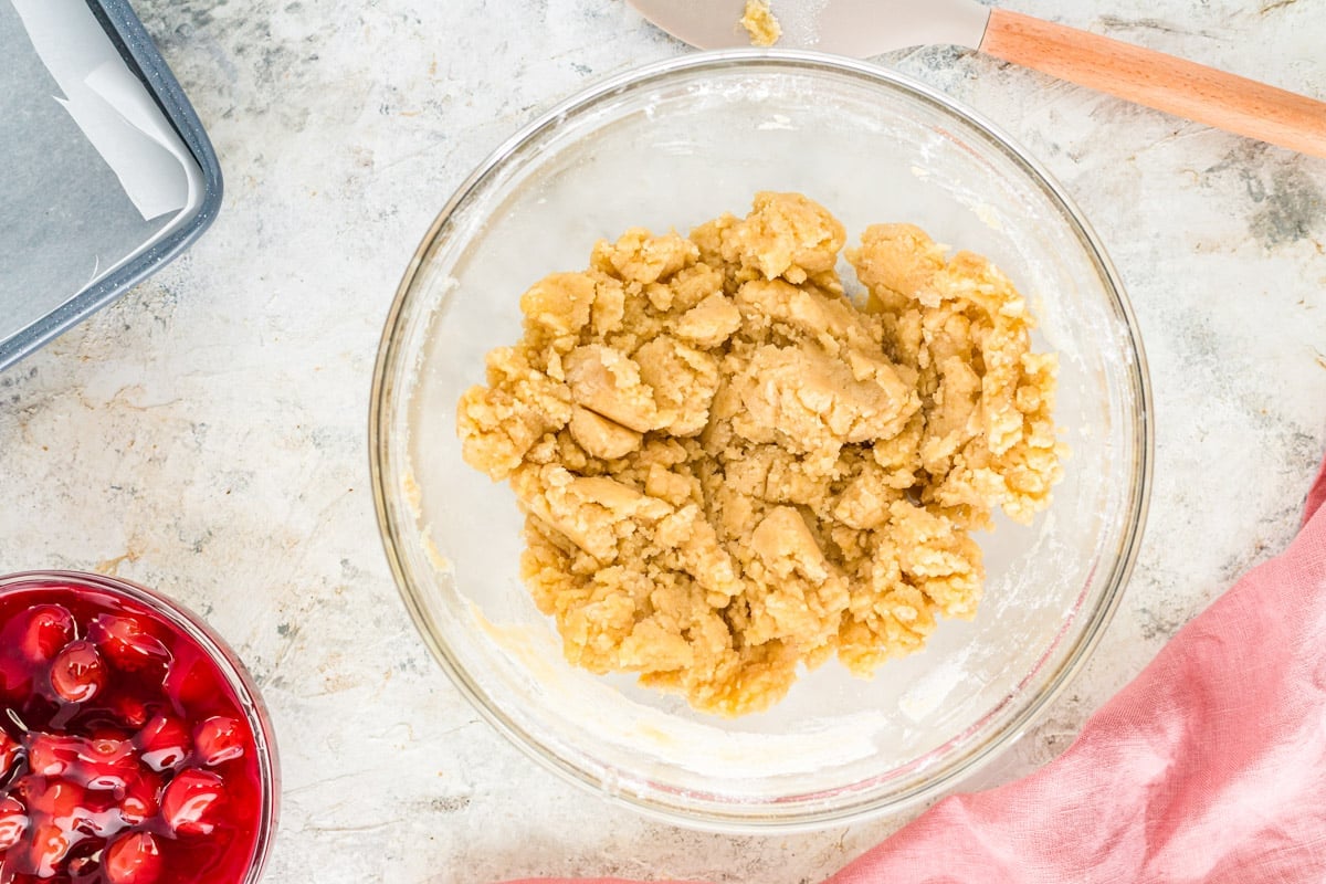 shortbread cookie bar dough in a glass bowl