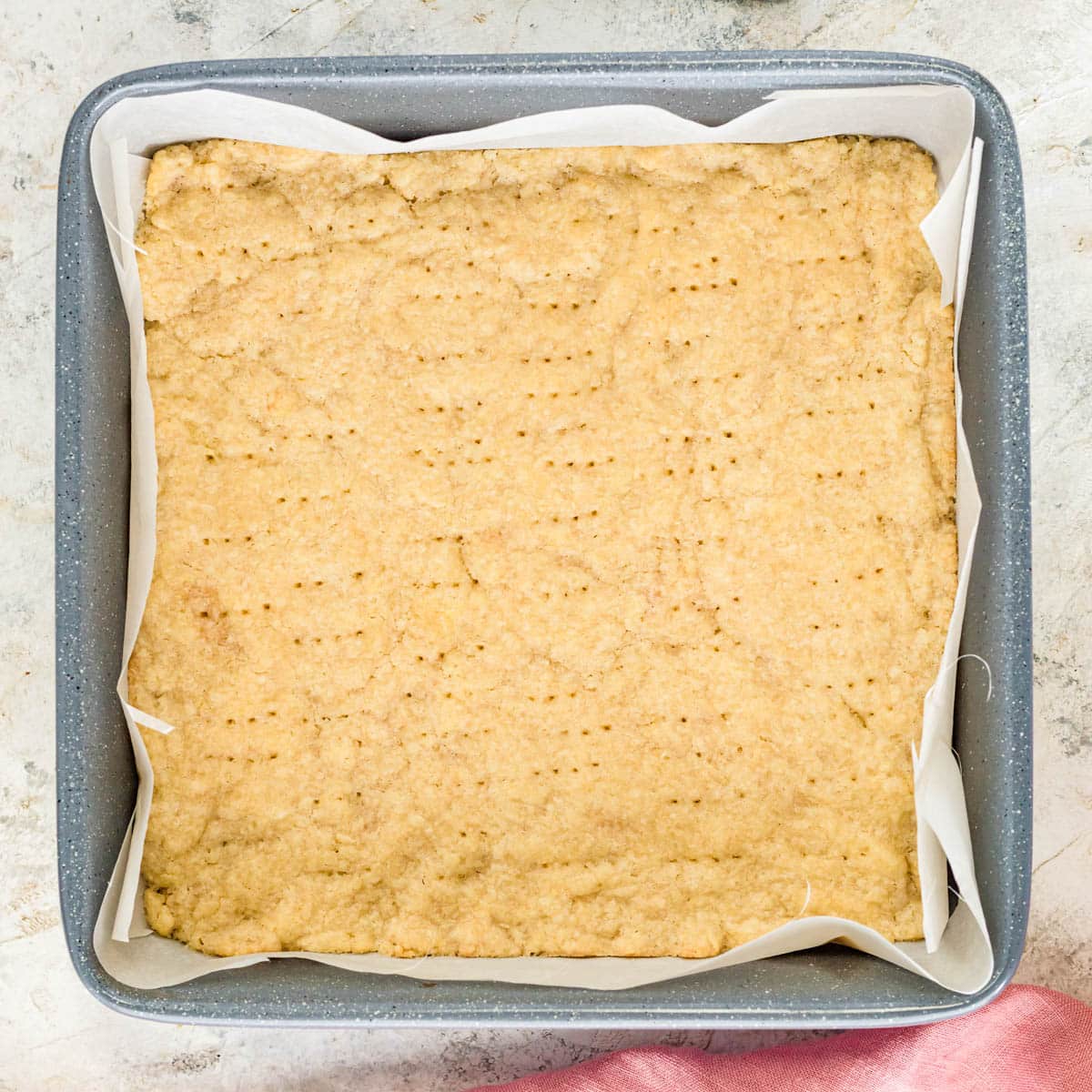 baked shortbread crust in an 8x8" baking pan