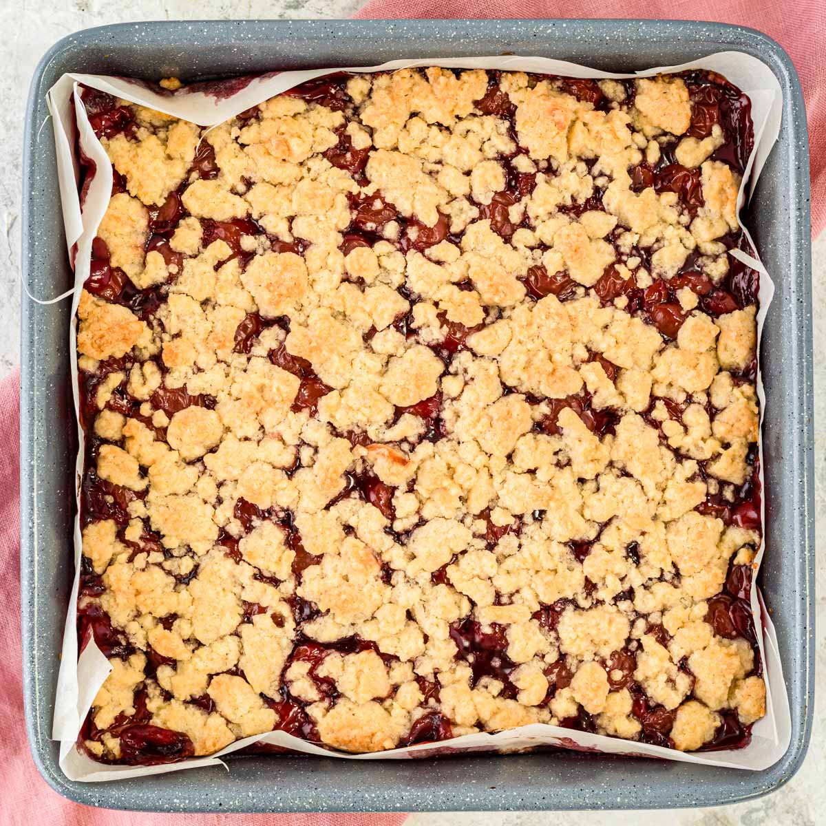 baked cherry bars in a pan