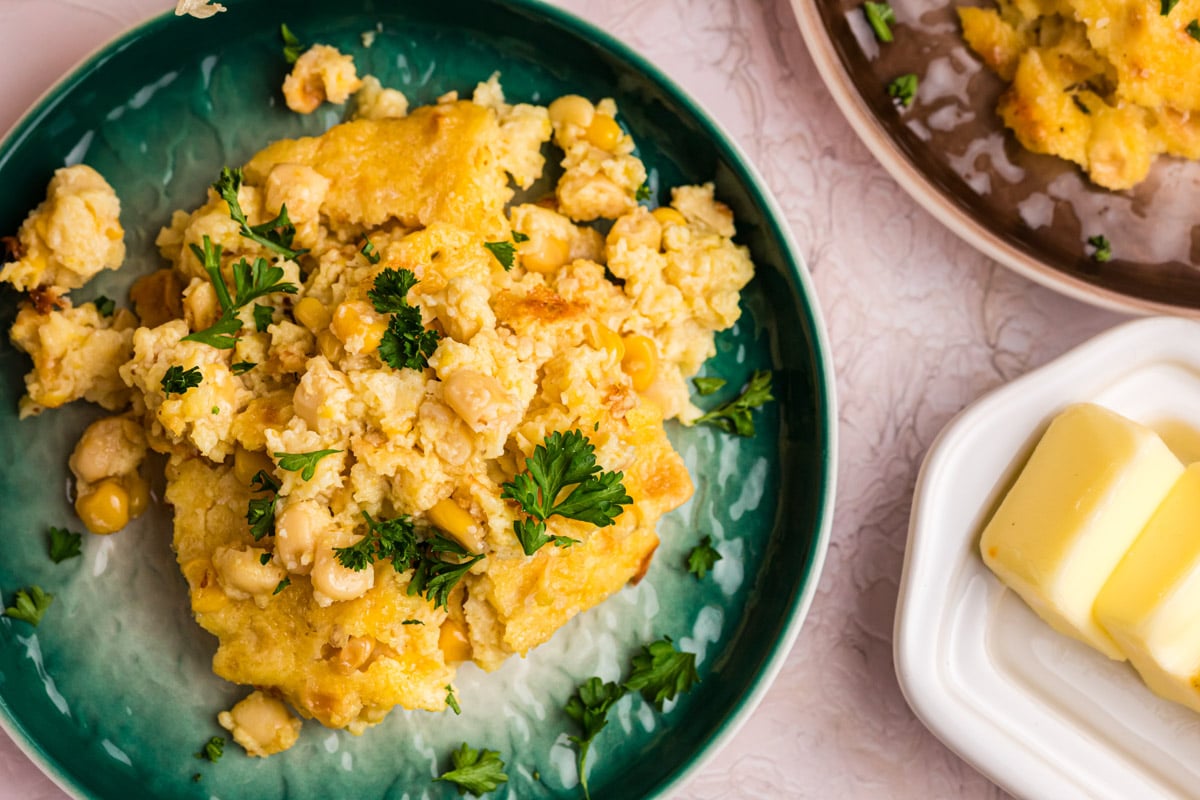 overhead view of a plate of corn pudding on a table