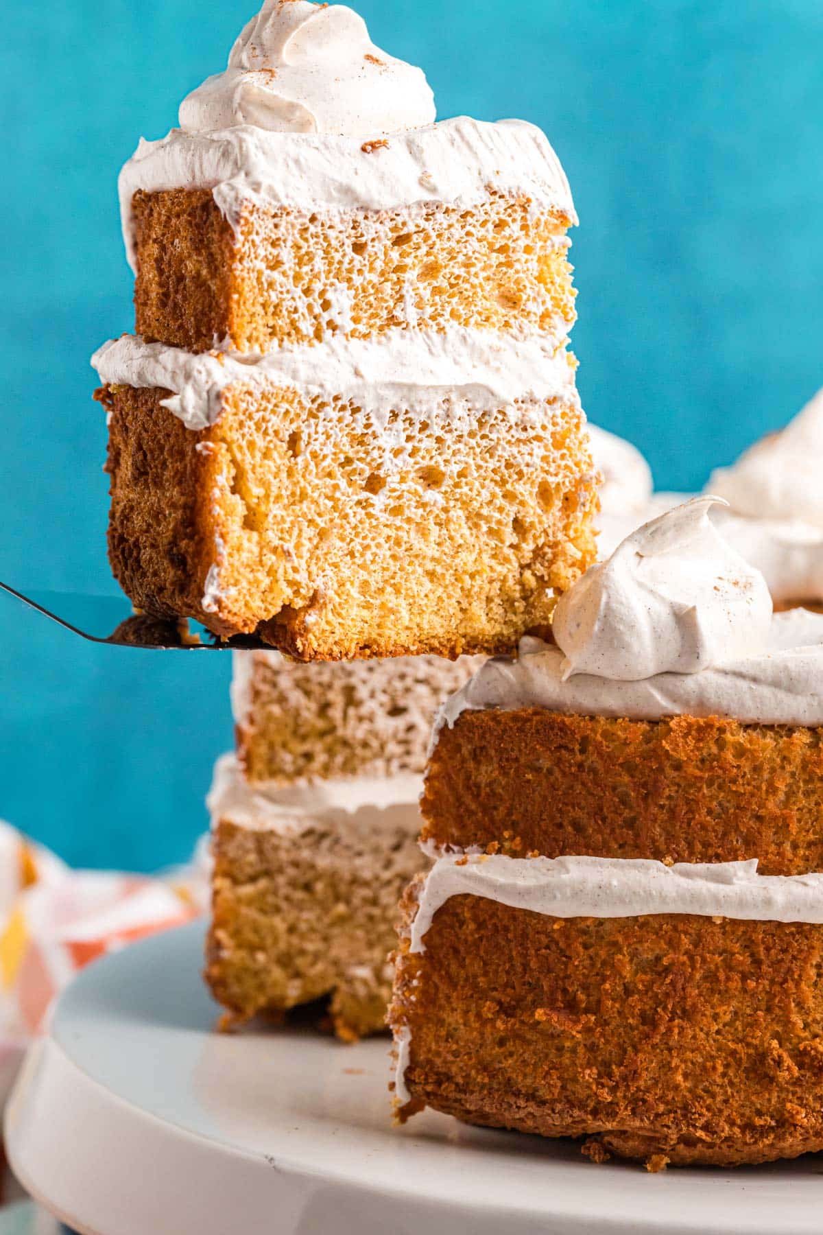 a piece of pumpkin angel food cake on a spatula