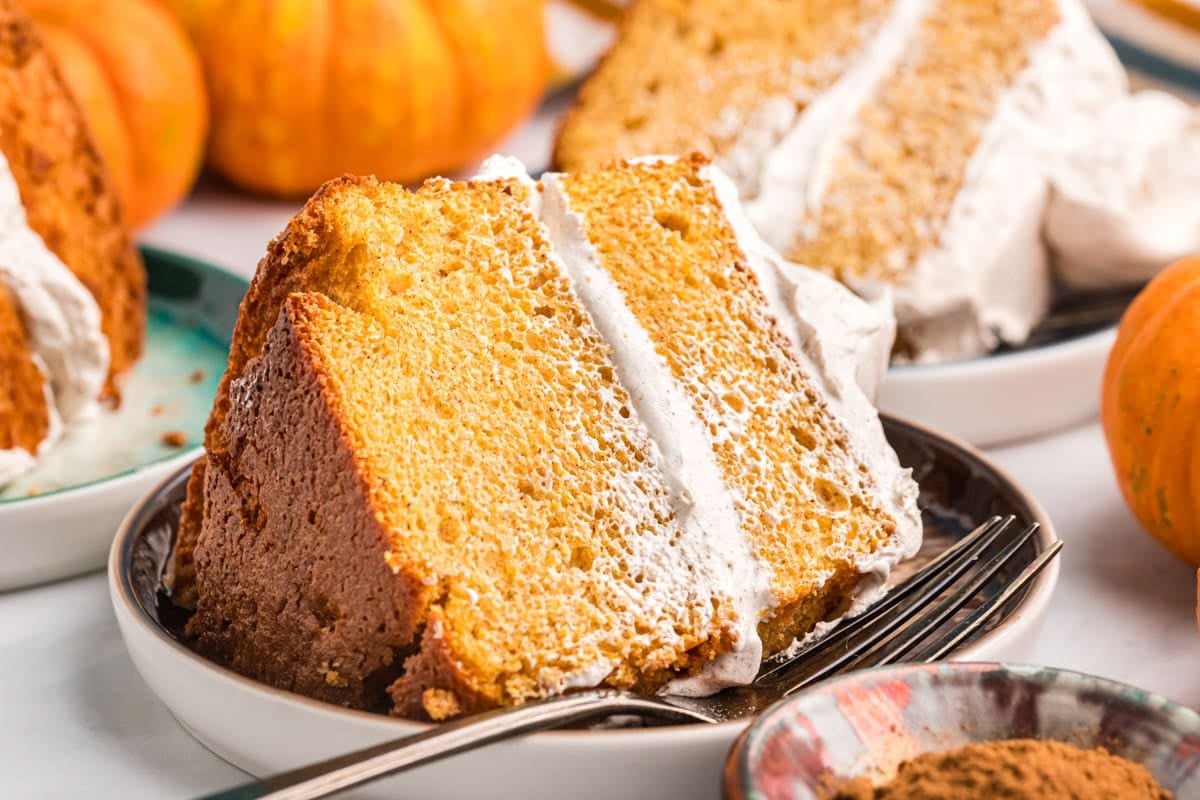 a slice of pumpkin angel food cake on a plate