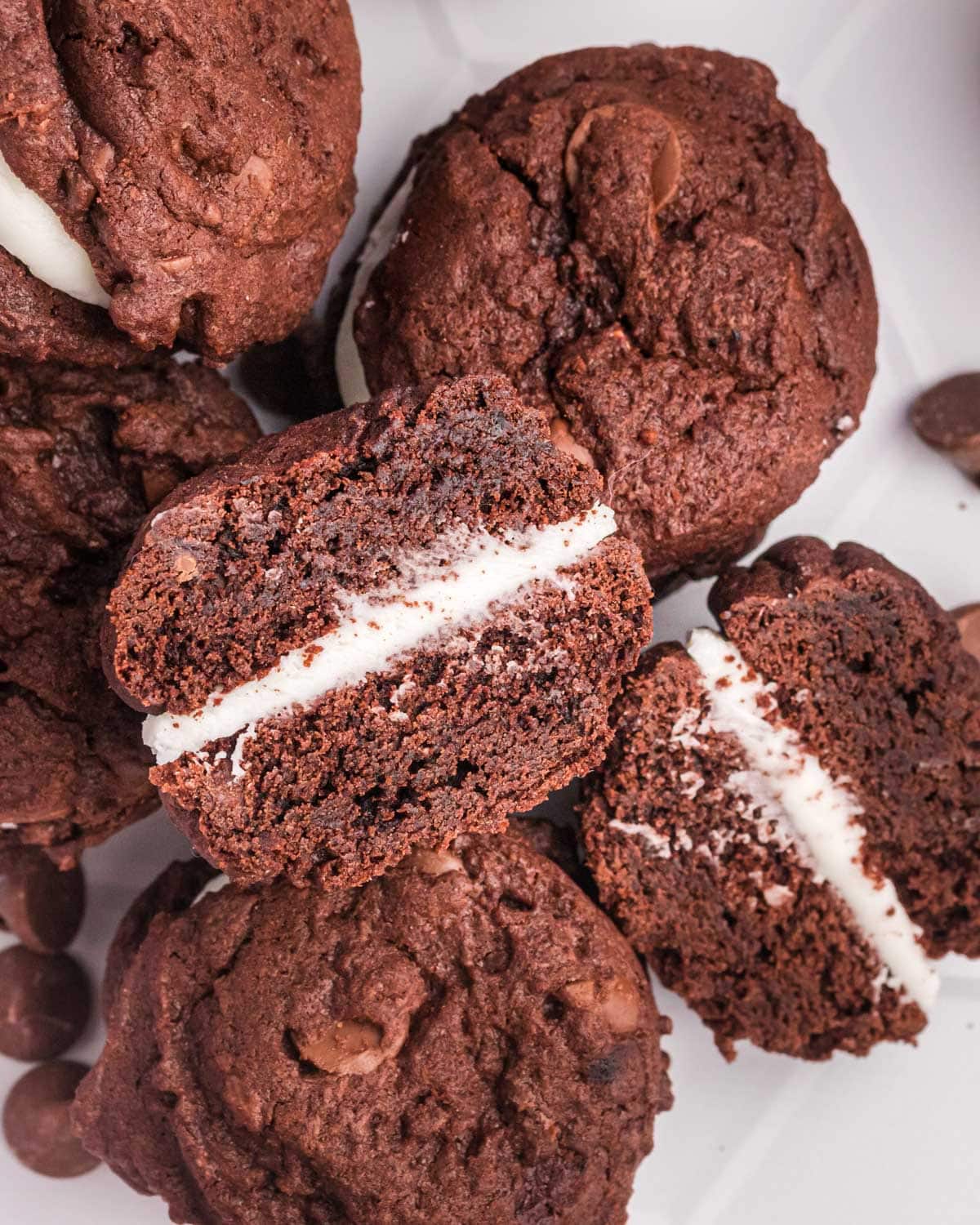 chocolate sandwich cookies with one cut in half