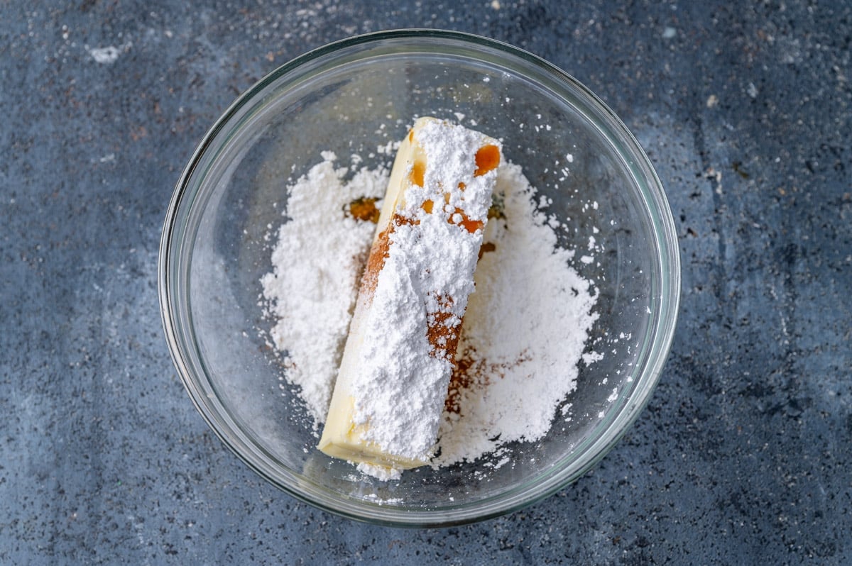 ingredients for cinnamon butter in a glass bowl