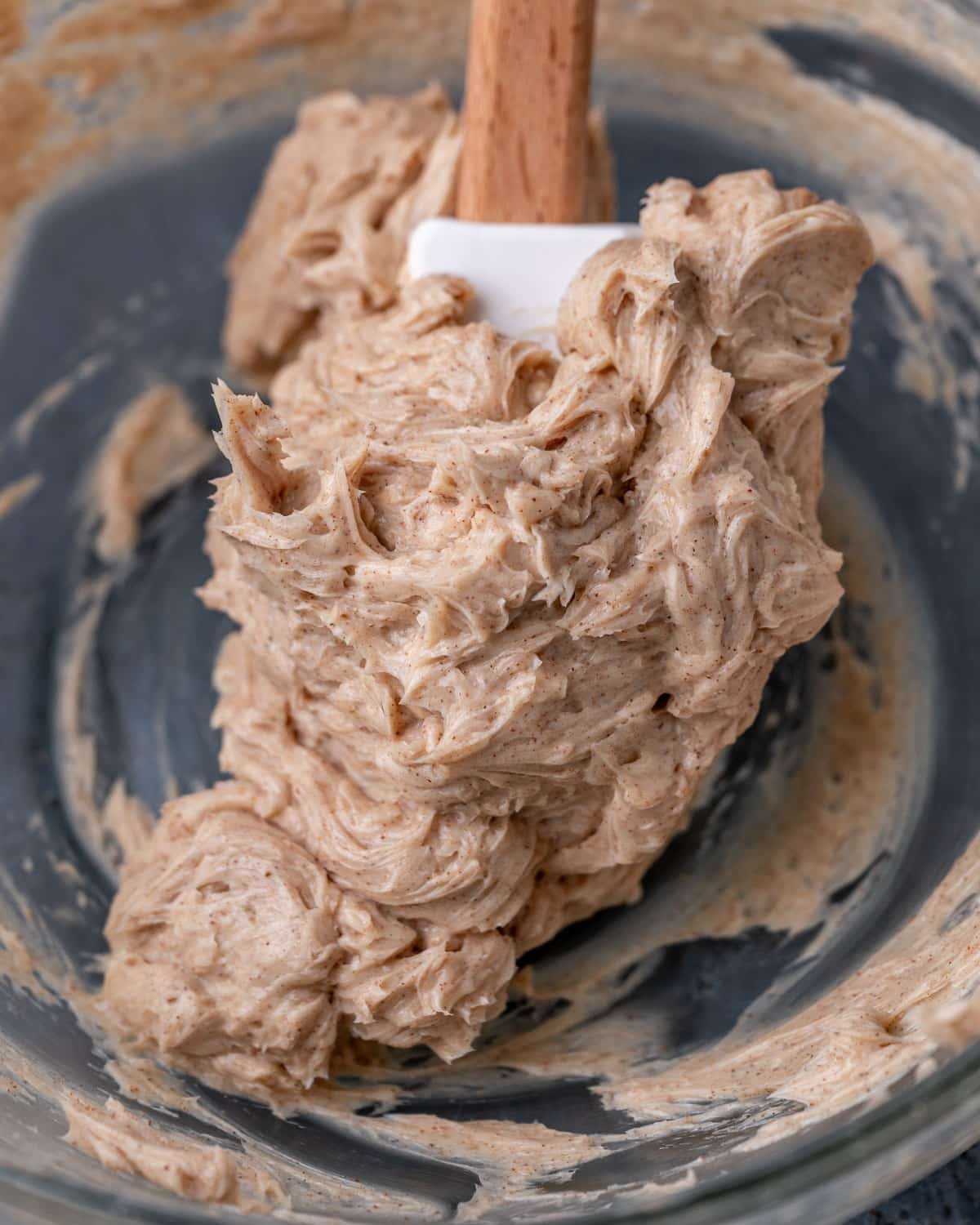 cinnamon butter in a mixing bowl with a spatula