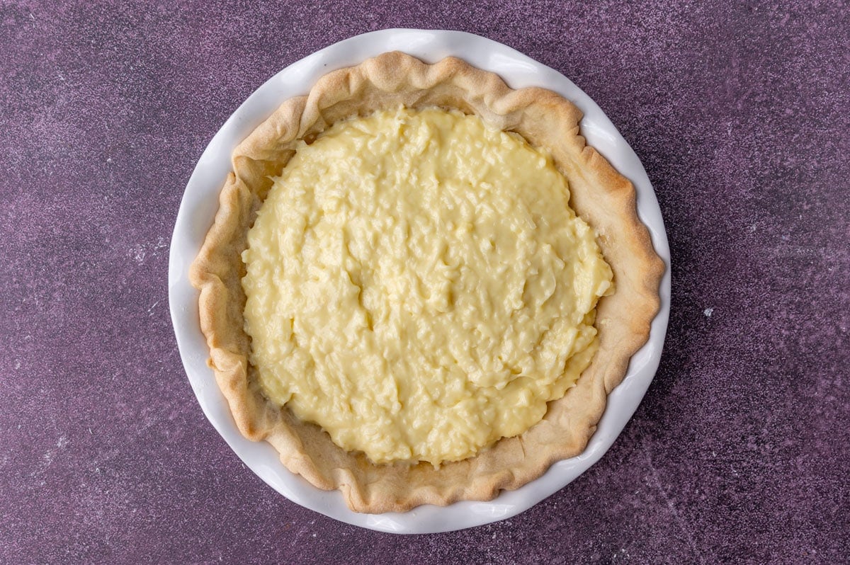 coconut cream pie without whipped cream in a pie pan