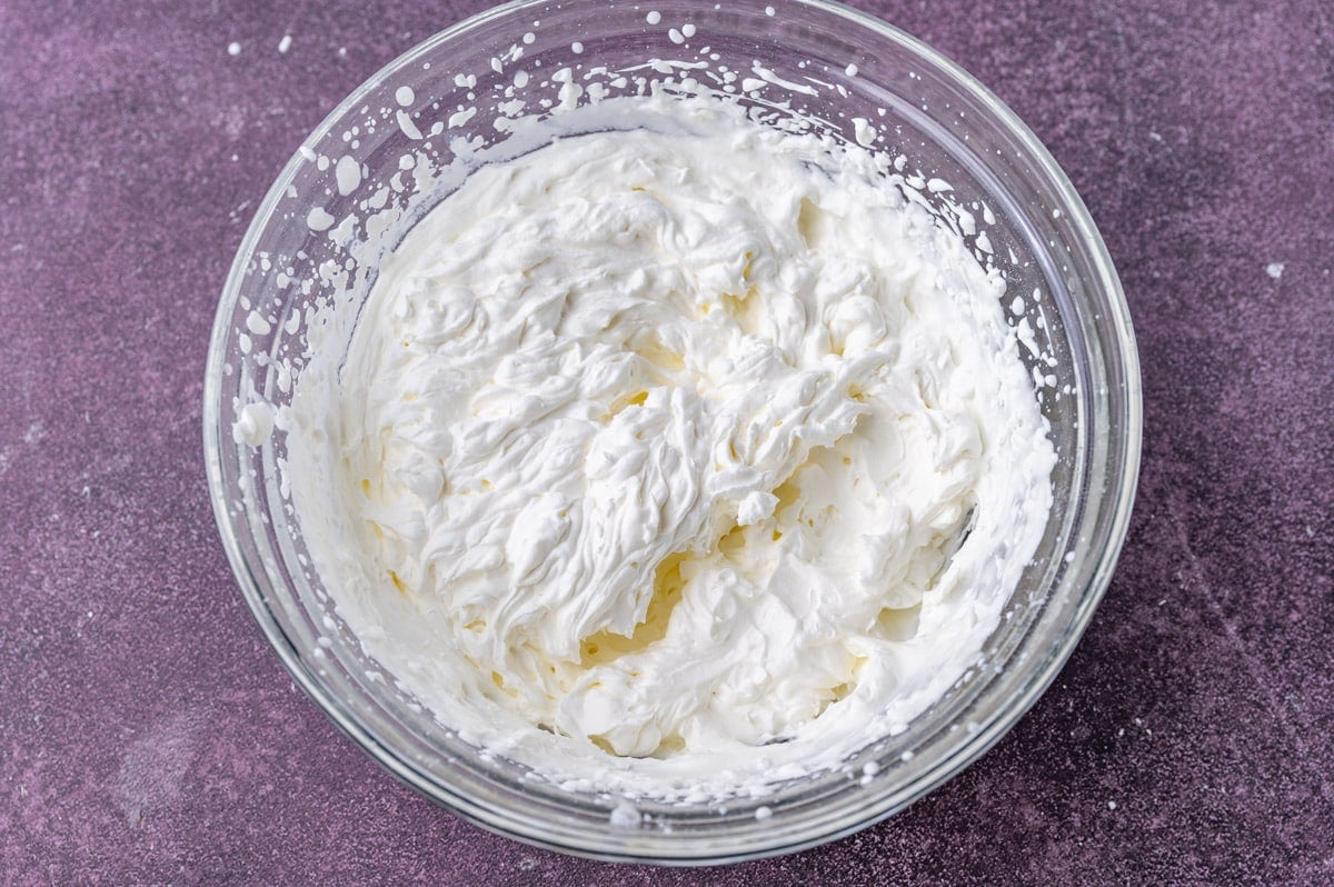 whipped cream in a glass bowl