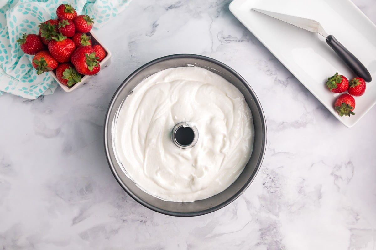 unbaked angel food cake batter in a pan