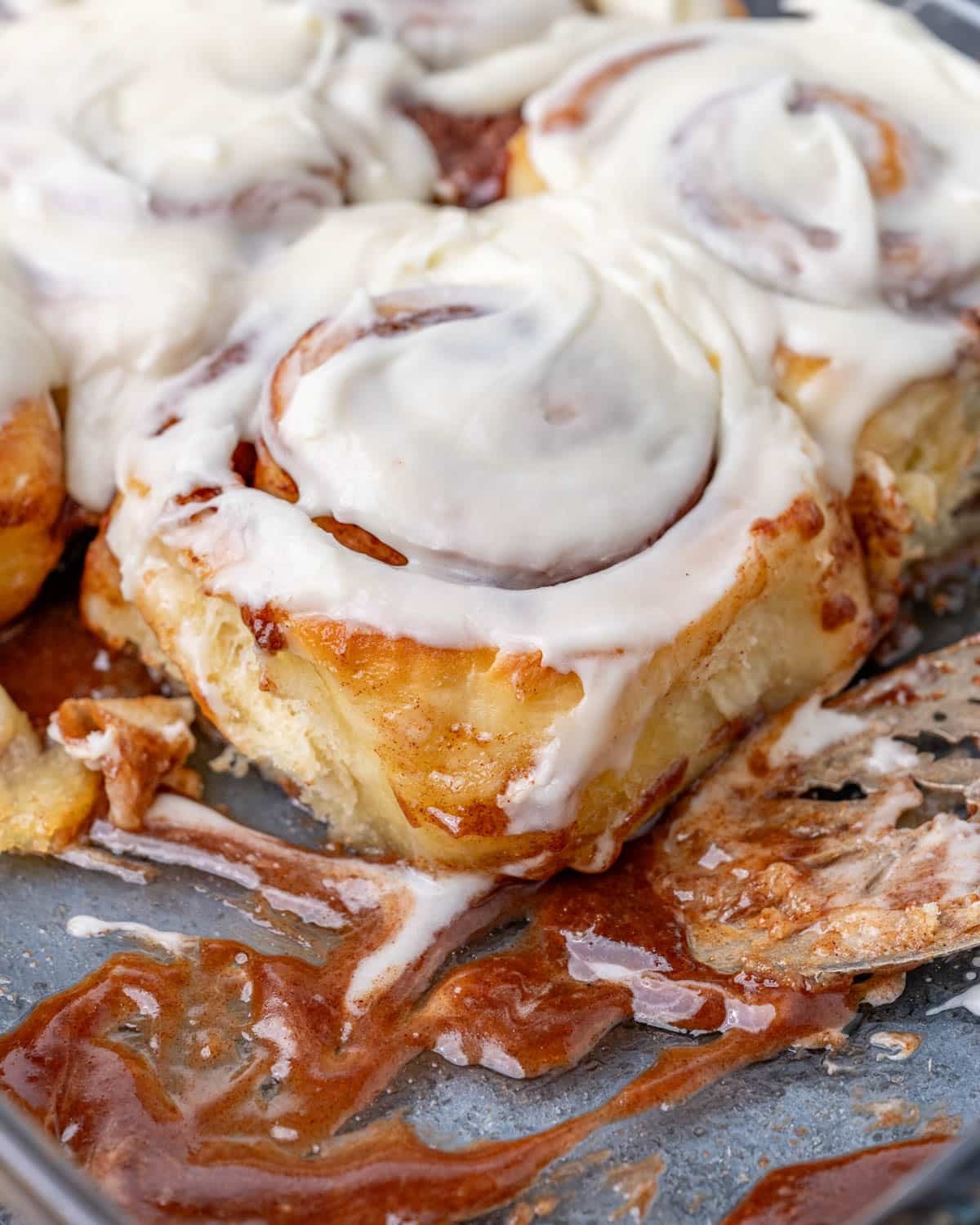 homemade cinnamon rolls in a baking pan