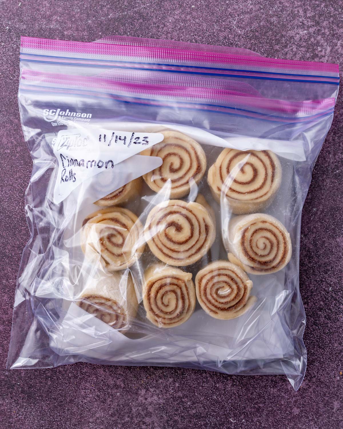 unbaked cinnamon rolls in plastic freezer bags