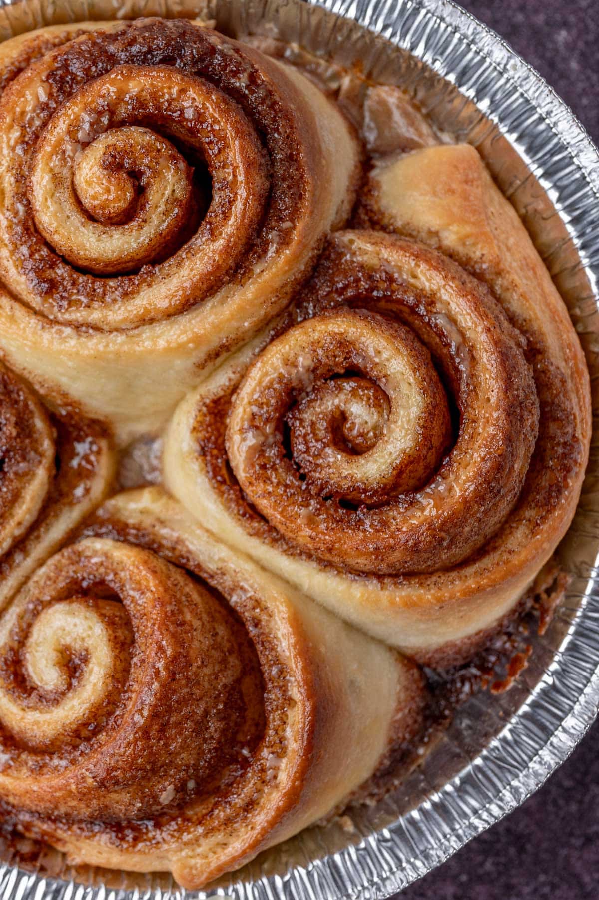 4 cinnamon rolls baked in a foil pan