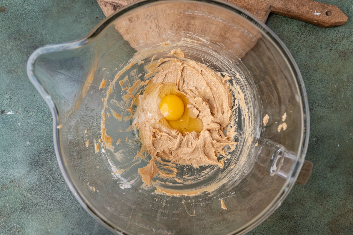 creamed butter and peanut butter with an egg on top