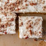 paula deen pumpkin bars cut into squares in a pan