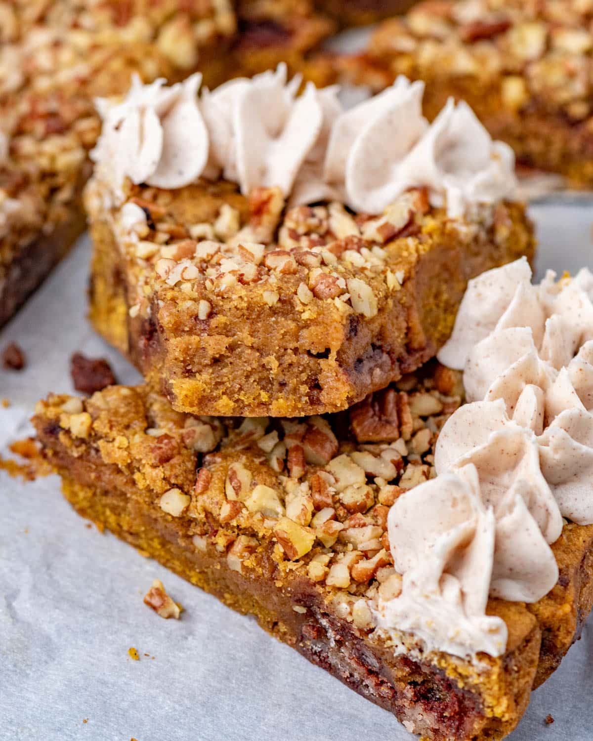 pumpkin cookie cake stacked with a bite out of it