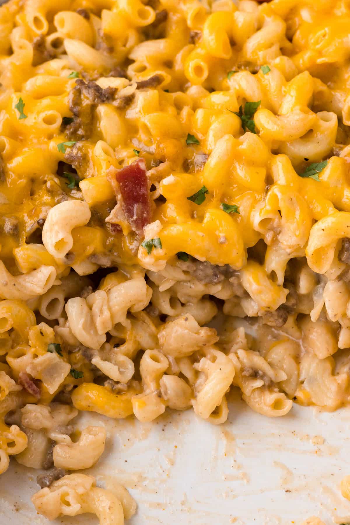 overhead view of bacon cheeseburger casserole in a baking pan