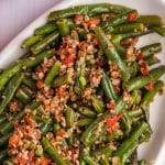 overhead view of a plate of christmas green beans