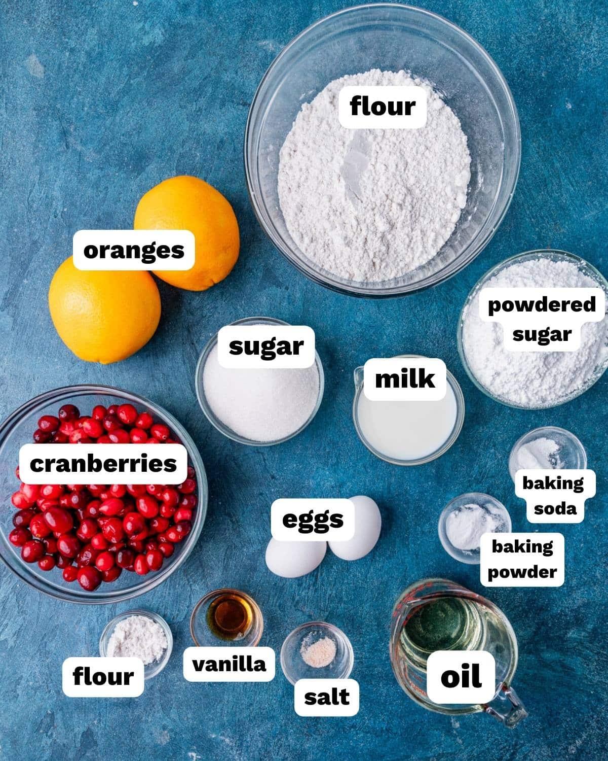ingredients for cranberry orange bread on a table
