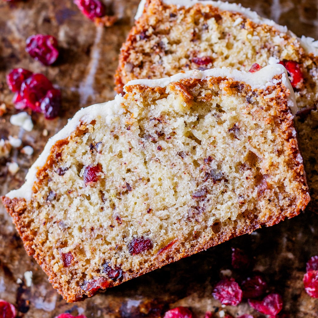 two slices of cranberry pecan bread