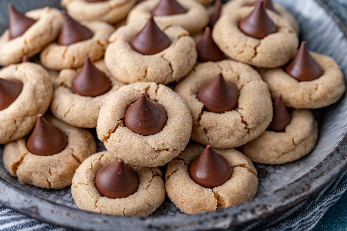 a plate of peanut blossoms cookies