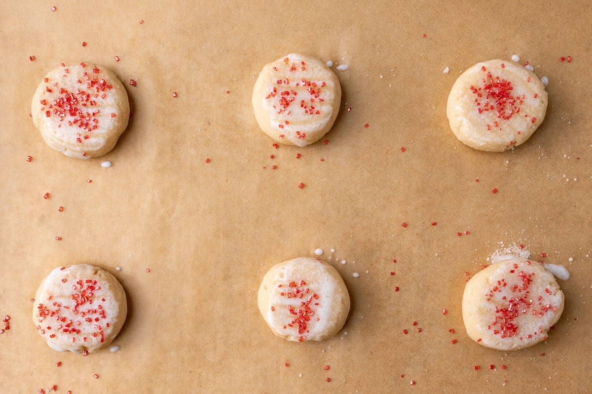 unbaked sugar cookie dough on a baking mat