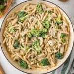 overhead view of chicken, broccoli and pasta in cheesy sauce