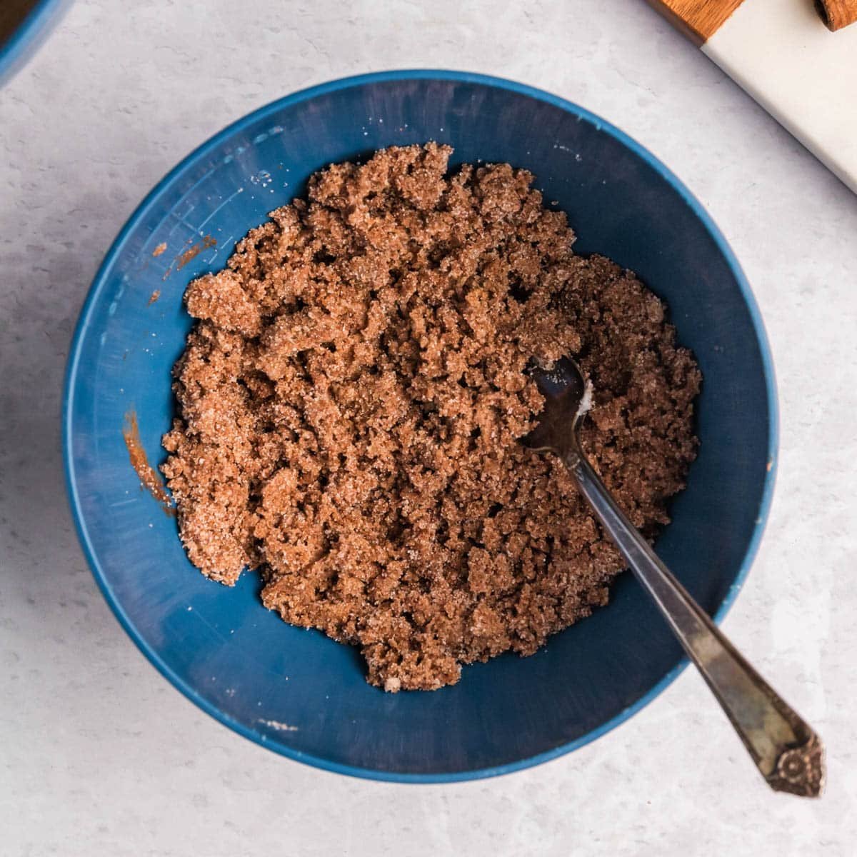 cinnamon sugar butter mixture in a bowl with a spoon