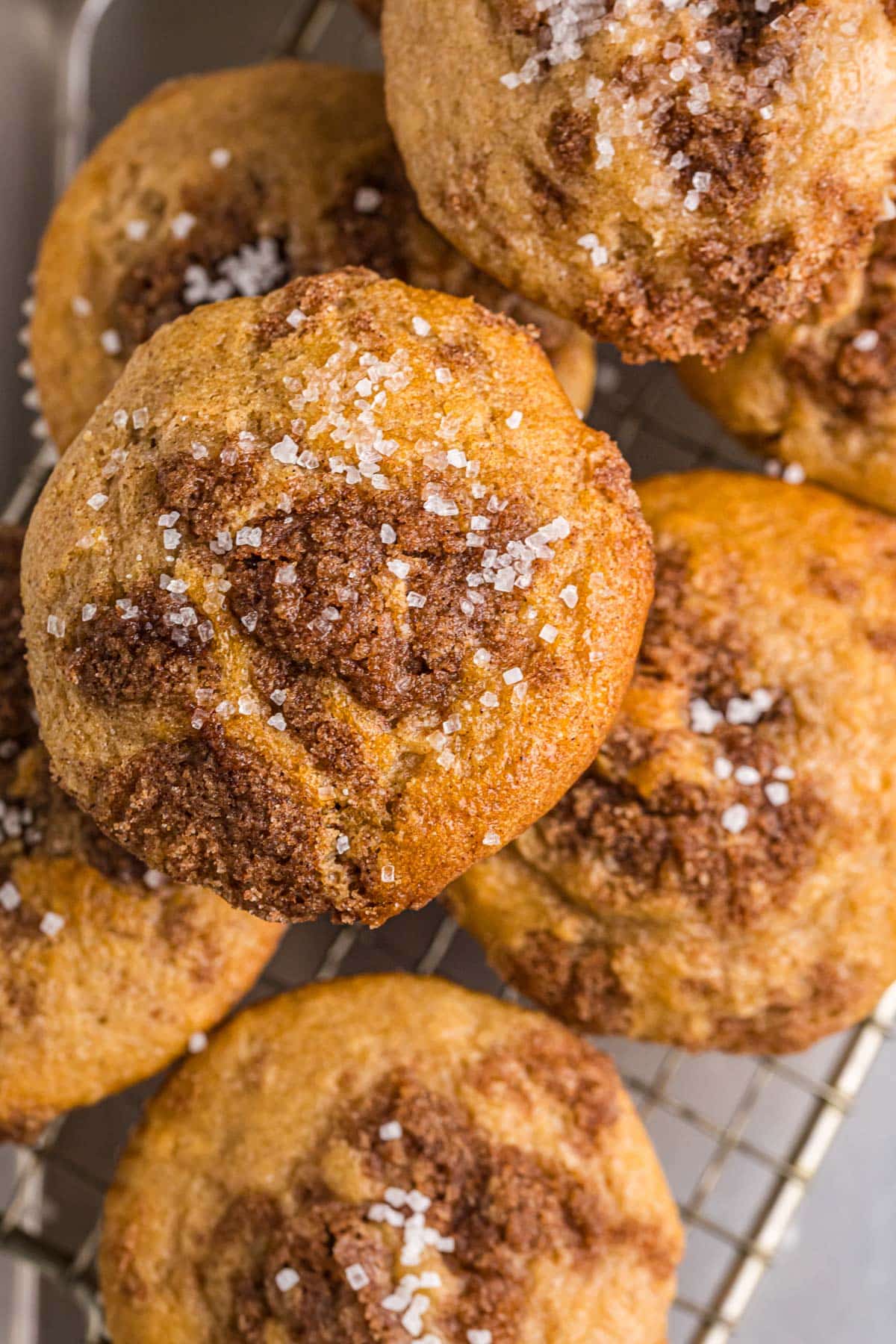 overhead view of muffins with cinnamon sugar streusel baked inside