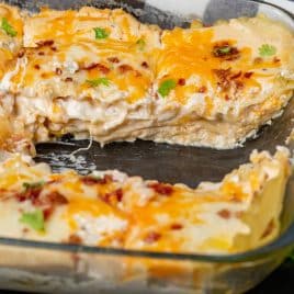 chicken bacon lasagna in a glass baking pan